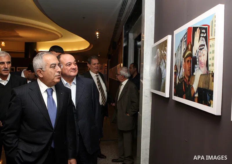 Palestinian prime minister Salam Fayyad attends a celebration to mark the seventh anniversary of the death of late Palestinian leader Yasser Arafat in the West Bank city of Ramallah on November 11, 2011. Photo by Mustafa...