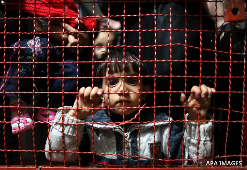 Palestinians enjoy a ride in an amusement park, during Eid al-Adha in Gaza City, Nov. 10, 2011. Muslims worldwide celebrate Eid al-Adha, or the Feast of the Sacrifice, with the sacrificial killing of livestock to commemo...