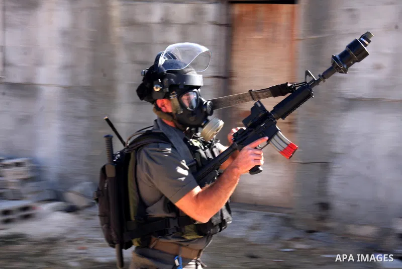 Israeli forces clash with Palestinian protestors during a weekly demonstration against Israeli-occupation in the northern West Bank village of Kfar Kadum, on November 11, 2011. The Palestinian leadership is unsure how to...