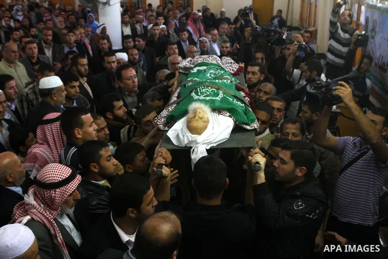 Palestinian mourn the body of Mohammed al-Najjar, one of the founders of Muslims brotherhood in Palestine and Hamas movement leader, in the southern Gaza Strip town of Khan Younis on Nov. 11,2011 . Photo by Ashraf Amra