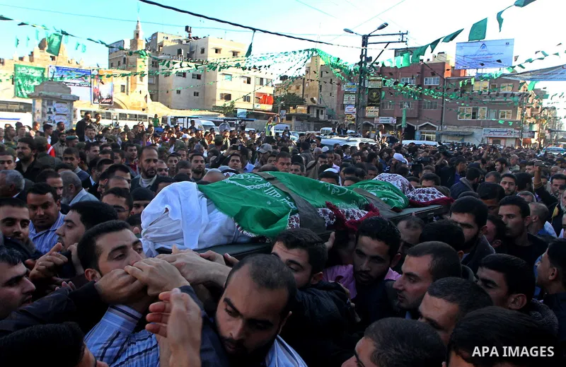 Palestinian mourn the body of Mohammed al-Najjar, one of the founders of Muslims brotherhood in Palestine and Hamas movement leader, in the southern Gaza Strip town of Khan Younis on Nov. 11,2011 . Photo by Ashraf Amra
