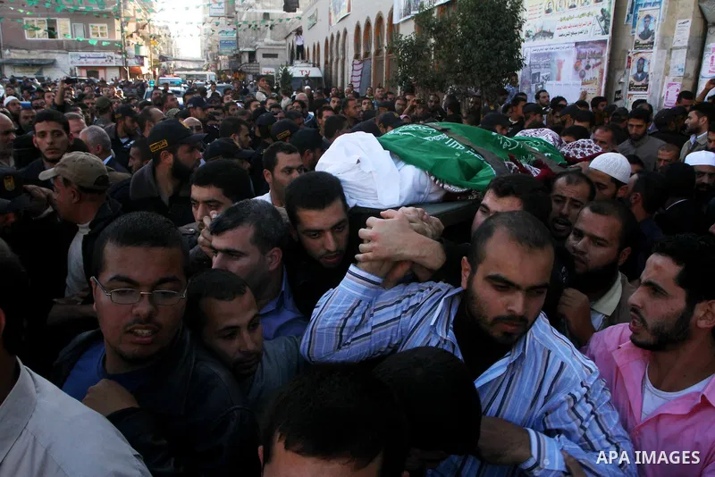 Palestinian mourn the body of Mohammed al-Najjar, one of the founders of Muslims brotherhood in Palestine and Hamas movement leader, in the southern Gaza Strip town of Khan Younis on Nov. 11,2011 . Photo by Ashraf Amra