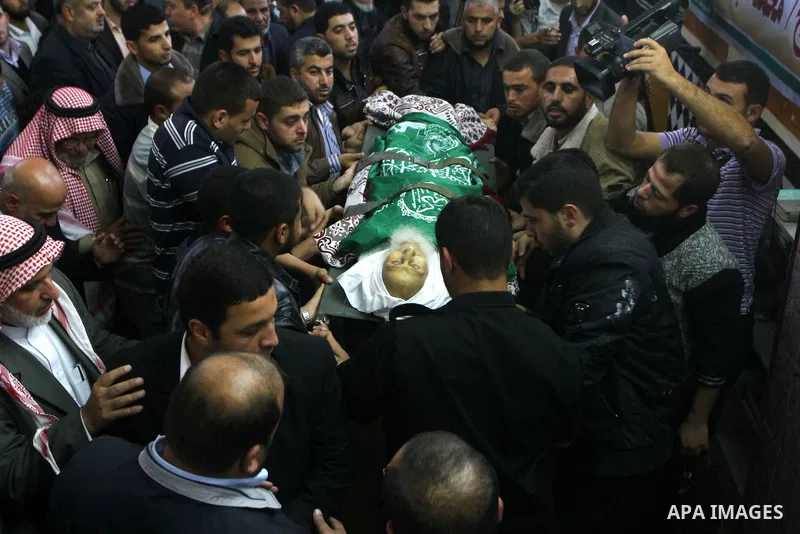 Palestinian mourn the body of Mohammed al-Najjar, one of the founders of Muslims brotherhood in Palestine and Hamas movement leader, in the southern Gaza Strip town of Khan Younis on Nov. 11,2011 . Photo by Ashraf Amra
