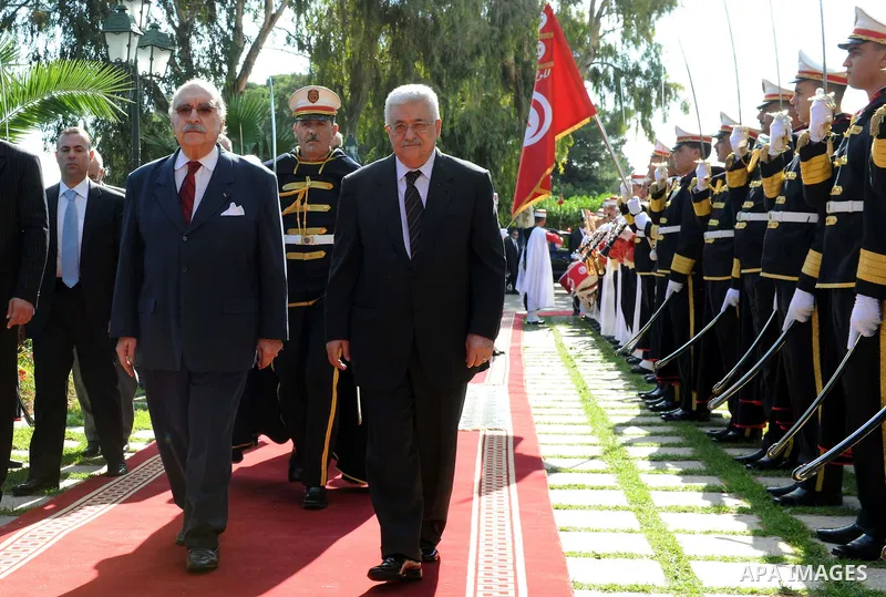 Palestinian President Mahmoud Abbas meets with Tunisian President Fouad Mebazaa during their talks in Tunis, Friday, Nov.11, 2011. Abbas and Fouad Mebazaa are expected to discuss Tunisia's recent elections and the Palest...