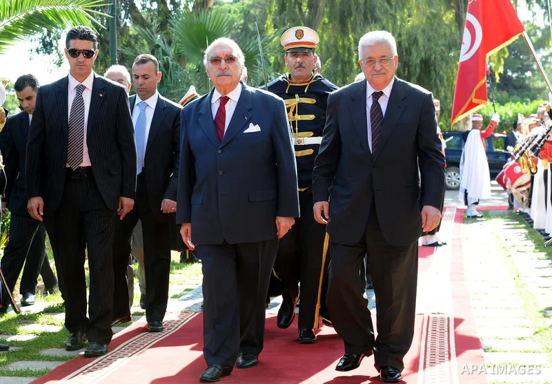 Palestinian President Mahmoud Abbas meets with Tunisian President Fouad Mebazaa during their talks in Tunis, Friday, Nov.11, 2011. Abbas and Fouad Mebazaa are expected to discuss Tunisia's recent elections and the Palest...
