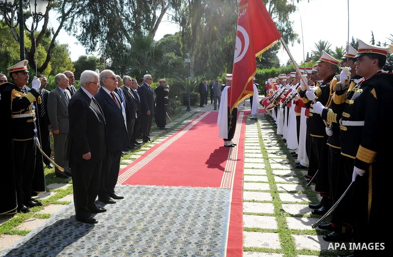 Palestinian President Mahmoud Abbas meets with Tunisian President Fouad Mebazaa during their talks in Tunis, Friday, Nov.11, 2011. Abbas and Fouad Mebazaa are expected to discuss Tunisia's recent elections and the Palest...