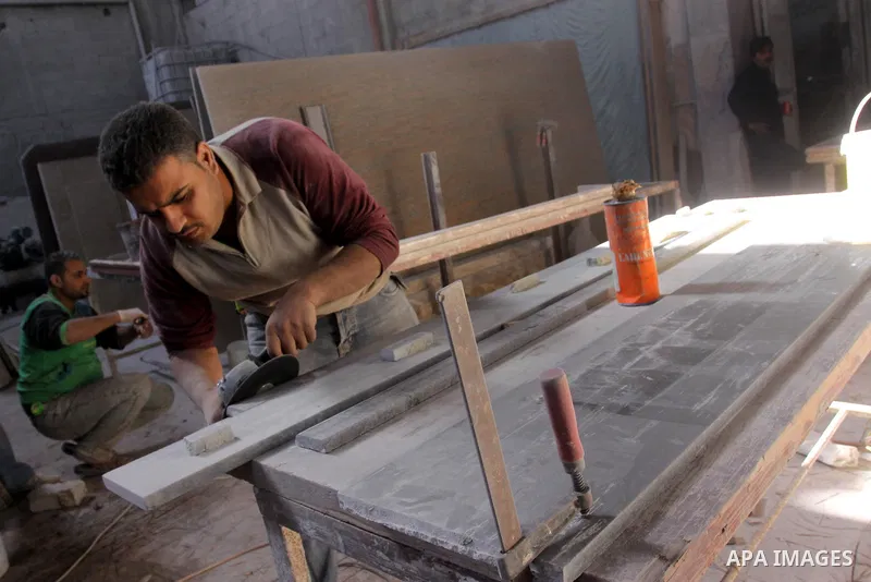 Palestinian worker prepare marble in a factory for marbles in Gaza city on Nov. 13, 2010. Palestinian suffer from decreasing in the industrial materials because of the israeli blockade on Gaza Strip. Photo by Mohammed As...