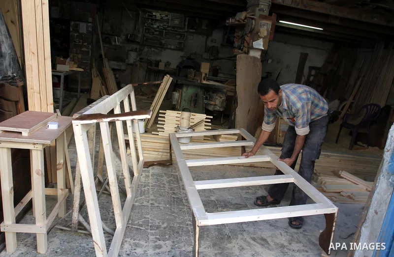 A Palestinian carpenter works at his shop in Gaza city on Nov. 14, 2011. Israel allow the Palestinians to export of furniture to Israel and Europe. Photo by Mohammed Asad