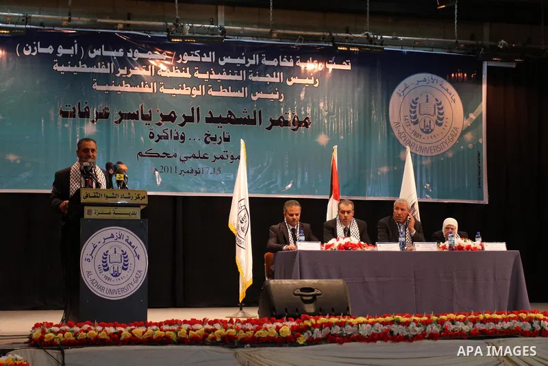 Palestinians participate in a conference about the late president Yasser Arafat which organized by Fatah Movement, in Gaza city on Nov. 15,2011. Photo by Mohammed Asad