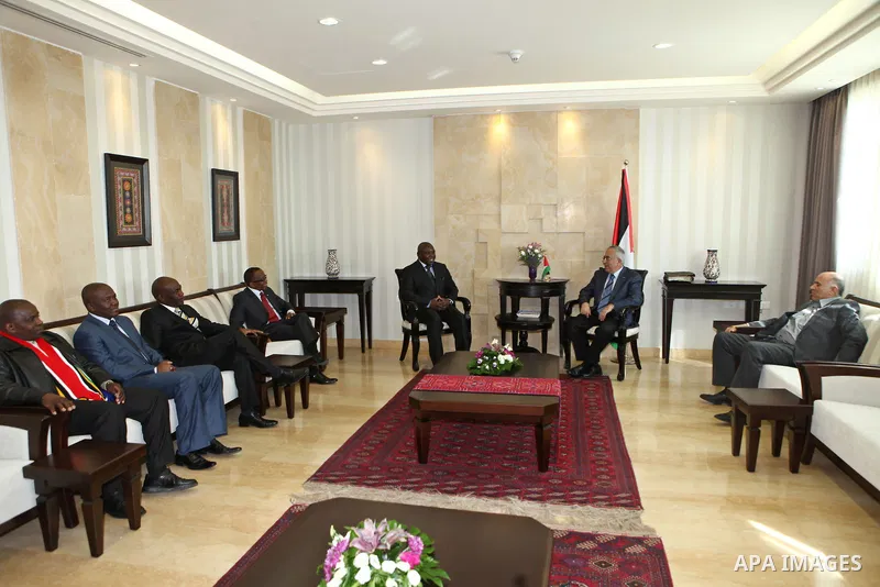 Palestinian Prime Minister, Salam Fayyad meets with the Chairman of the Federation of Football in South Africa, in the West Bank city of Nablus on Nov. 15, 2011. Photo by Mustafa Abu Dayeh