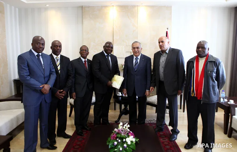 Palestinian Prime Minister, Salam Fayyad meets with the Chairman of the Federation of Football in South Africa, in the West Bank city of Nablus on Nov. 15, 2011. Photo by Mustafa Abu Dayeh