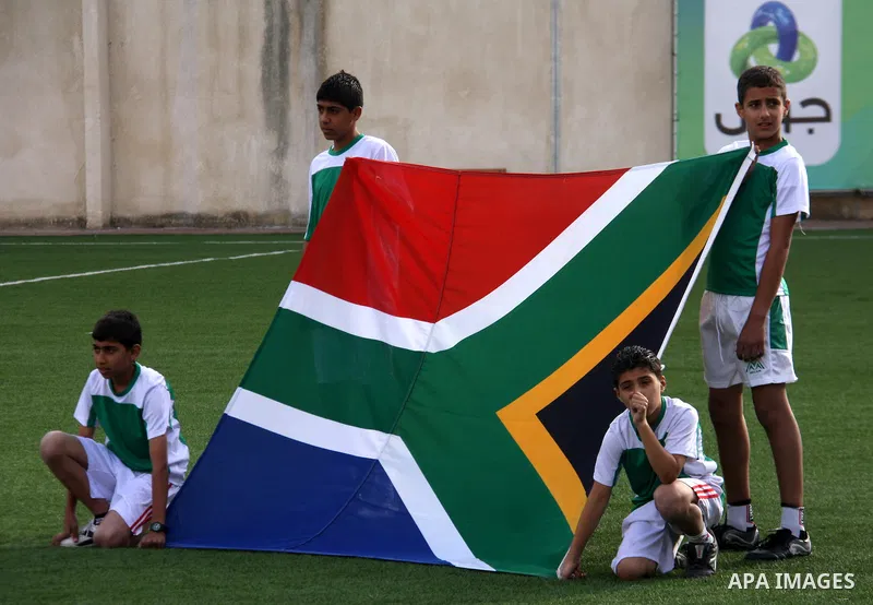 Palestinian fans attend a match between South Africa football team and Palestine team in the West Bank town of Nablus, on Nov. 15, 2011. The match ended in 1-1draw. Photo by Wagdi Eshtayah