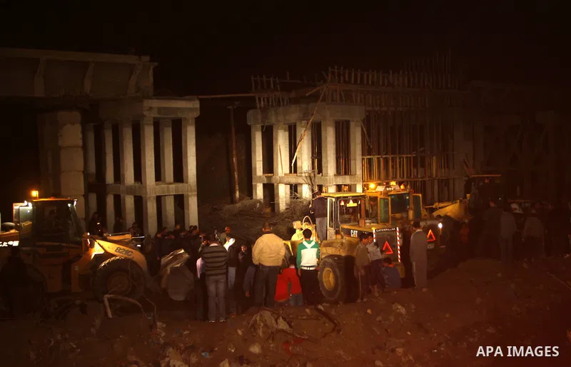 Palestinian rescue teams inspect the scene of a collapsed bridge on a main road in the central Gaza Strip that links Gaza City with the south, near Nusseirat, on November 17, 2011. Medical sources said two Palestinian wo...