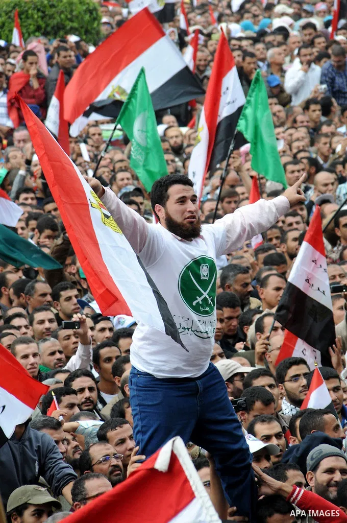 Protesters chant slogans in Tahrir Square, the focal point of the uprising that ousted President Hosni Mubarak, in Cairo, Egypt, Friday, Nov. 18, 2011. Thousands of Egyptians are rallying in Cairo's Tahrir square, with I...