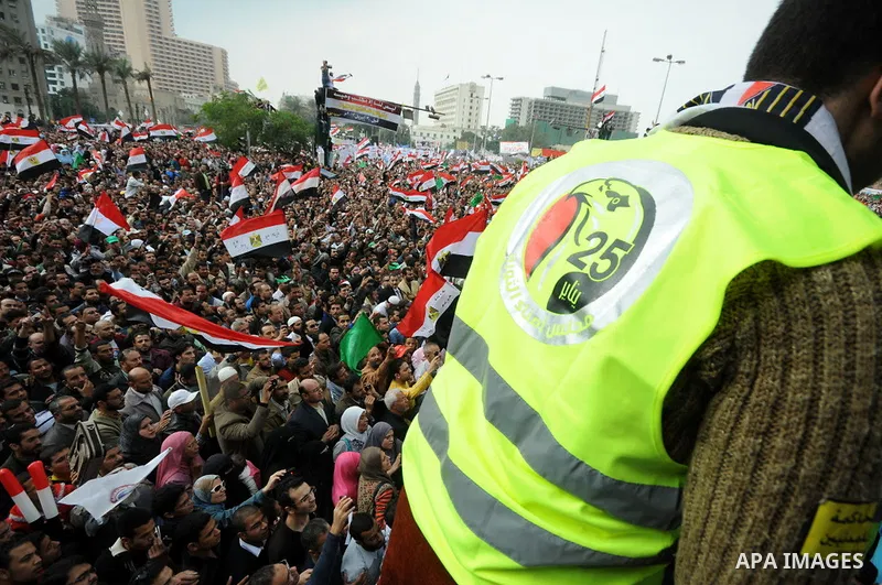 Protesters chant slogans in Tahrir Square, the focal point of the uprising that ousted President Hosni Mubarak, in Cairo, Egypt, Friday, Nov. 18, 2011. Thousands of Egyptians are rallying in Cairo's Tahrir square, with I...