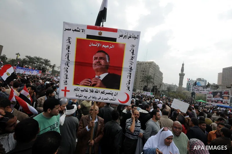 Protesters chant slogans in Tahrir Square, the focal point of the uprising that ousted President Hosni Mubarak, in Cairo, Egypt, Friday, Nov. 18, 2011. Thousands of Egyptians are rallying in Cairo's Tahrir square, with I...