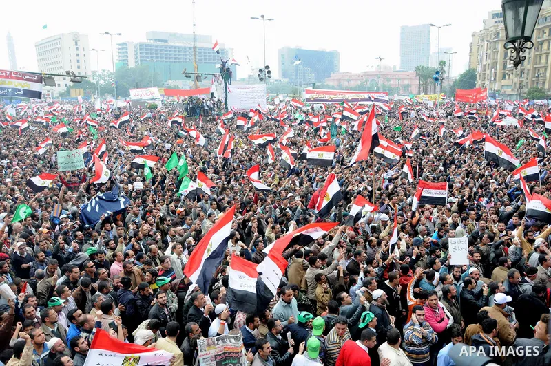 Protesters gather at Tahrir Square, the focal point of the uprising that ousted President Hosni Mubarak, in Cairo, Egypt, Friday, Nov. 18, 2011. Thousands of Egyptians are rallying in Cairo's Tahrir square, with Islamist...