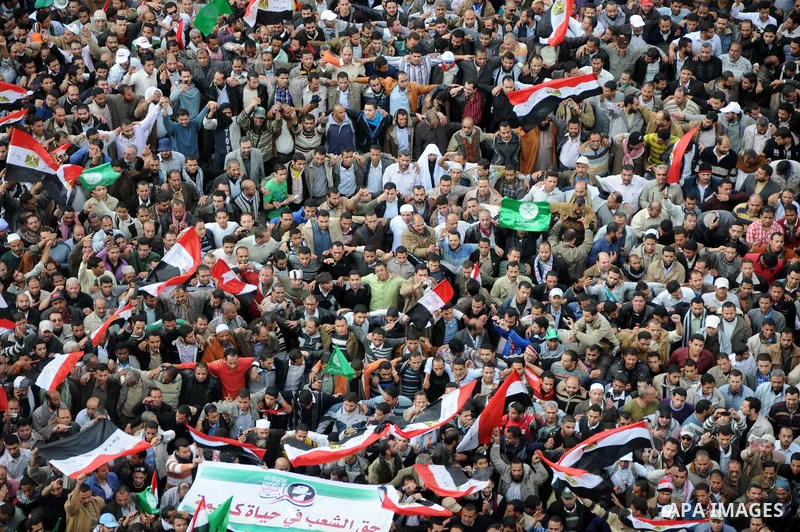 Protesters gather at Tahrir Square, the focal point of the uprising that ousted President Hosni Mubarak, in Cairo, Egypt, Friday, Nov. 18, 2011. Thousands of Egyptians are rallying in Cairo's Tahrir square, with Islamist...