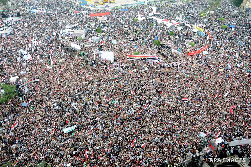 Protesters gather at Tahrir Square, the focal point of the uprising that ousted President Hosni Mubarak, in Cairo, Egypt, Friday, Nov. 18, 2011. Thousands of Egyptians are rallying in Cairo's Tahrir square, with Islamist...