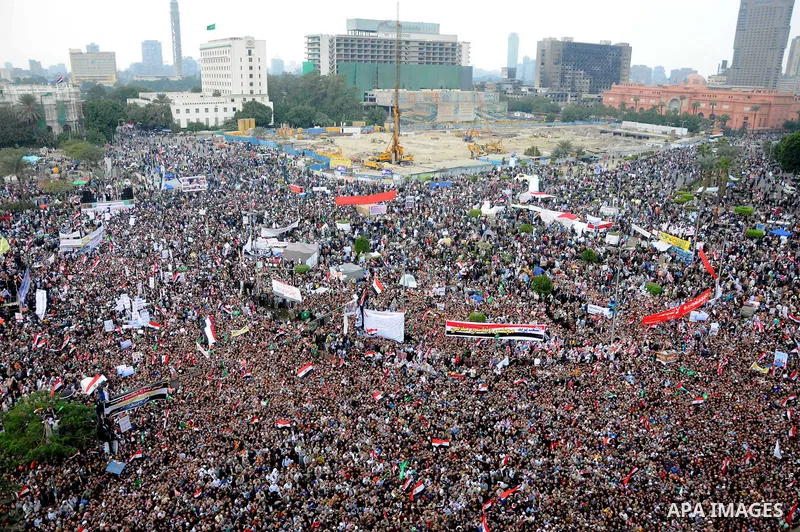 Protesters gather at Tahrir Square, the focal point of the uprising that ousted President Hosni Mubarak, in Cairo, Egypt, Friday, Nov. 18, 2011. Thousands of Egyptians are rallying in Cairo's Tahrir square, with Islamist...