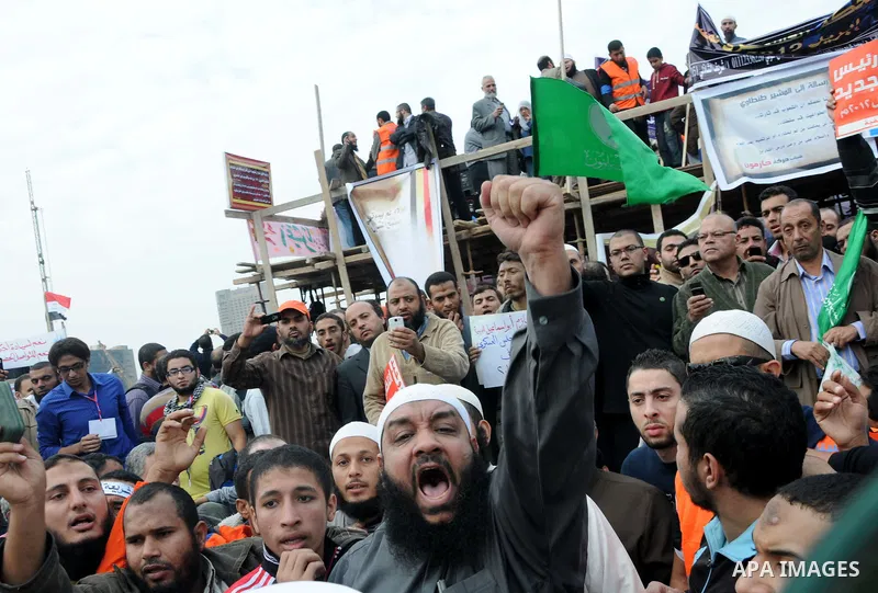 Protesters gather at Tahrir Square, the focal point of the uprising that ousted President Hosni Mubarak, in Cairo, Egypt, Friday, Nov. 18, 2011. Thousands of Egyptians are rallying in Cairo's Tahrir square, with Islamist...