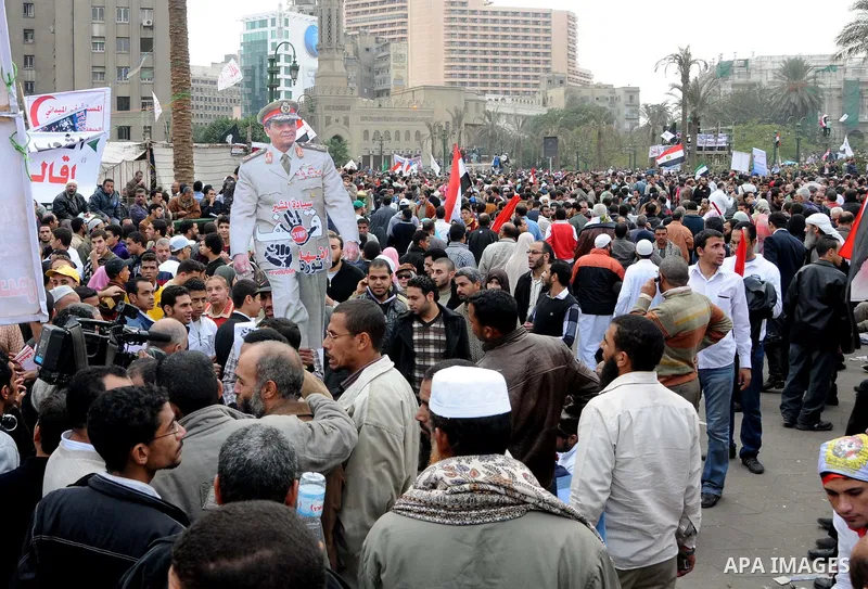 Protesters gather at Tahrir Square, the focal point of the uprising that ousted President Hosni Mubarak, in Cairo, Egypt, Friday, Nov. 18, 2011. Thousands of Egyptians are rallying in Cairo's Tahrir square, with Islamist...