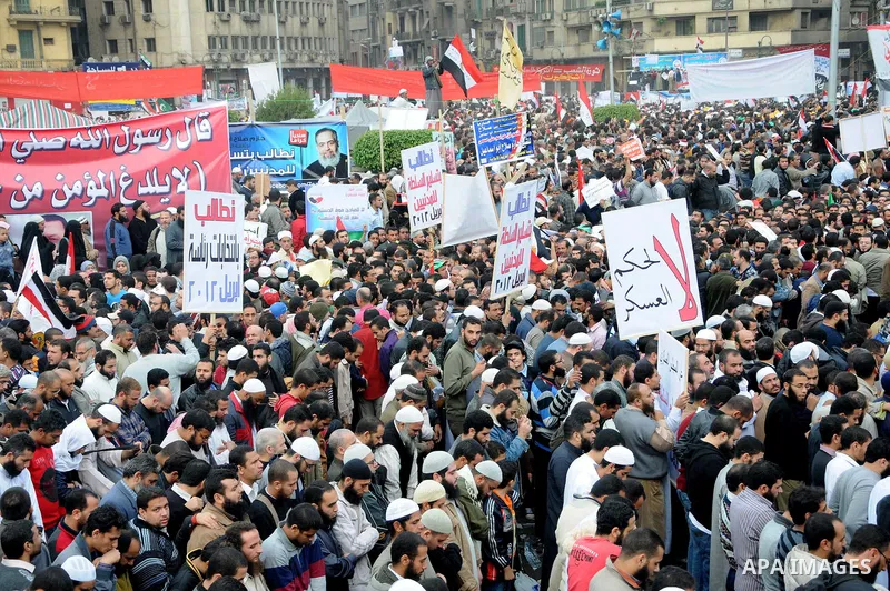 Protesters gather at Tahrir Square, the focal point of the uprising that ousted President Hosni Mubarak, in Cairo, Egypt, Friday, Nov. 18, 2011. Thousands of Egyptians are rallying in Cairo's Tahrir square, with Islamist...