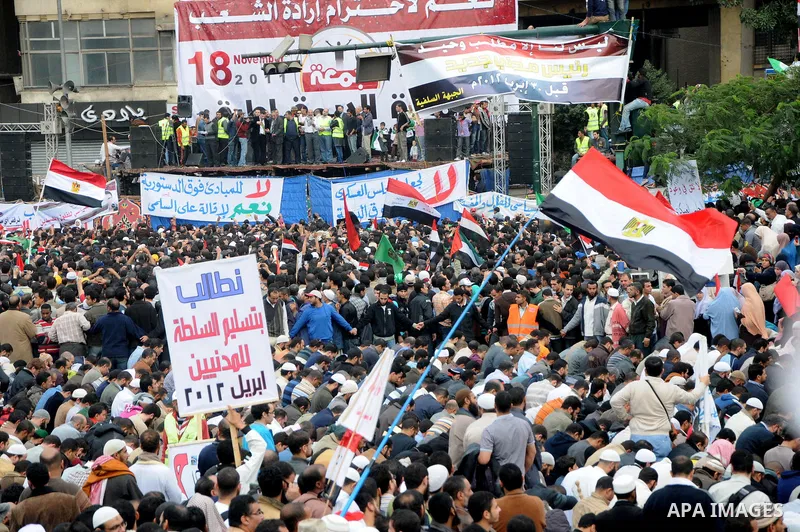 Protesters gather at Tahrir Square, the focal point of the uprising that ousted President Hosni Mubarak, in Cairo, Egypt, Friday, Nov. 18, 2011. Thousands of Egyptians are rallying in Cairo's Tahrir square, with Islamist...