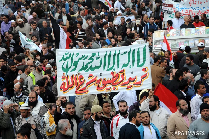 Protesters gather at Tahrir Square, the focal point of the uprising that ousted President Hosni Mubarak, in Cairo, Egypt, Friday, Nov. 18, 2011. Thousands of Egyptians are rallying in Cairo's Tahrir square, with Islamist...