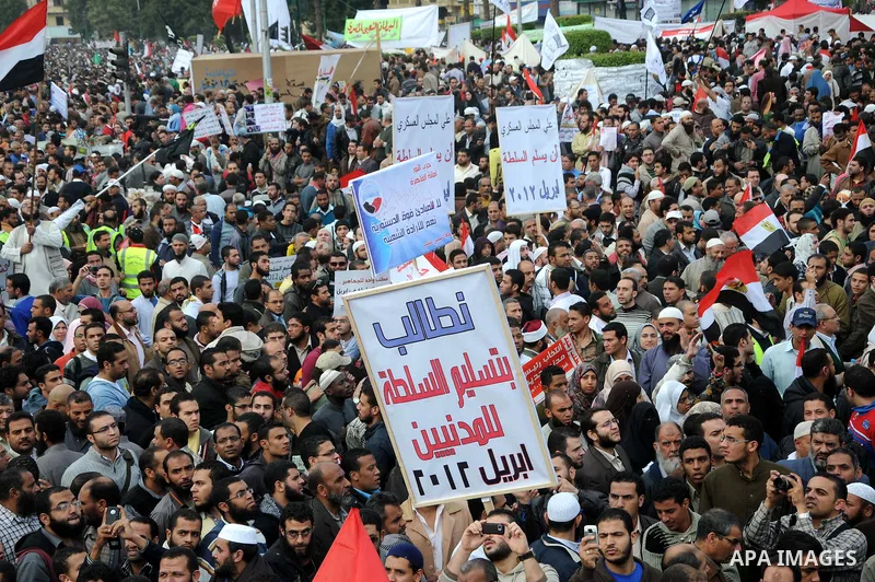 Protesters gather at Tahrir Square, the focal point of the uprising that ousted President Hosni Mubarak, in Cairo, Egypt, Friday, Nov. 18, 2011. Thousands of Egyptians are rallying in Cairo's Tahrir square, with Islamist...