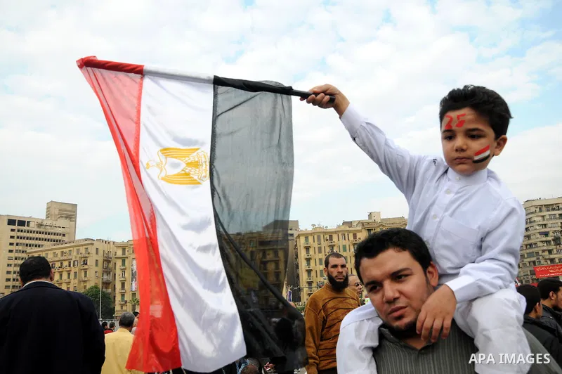 Protesters gather at Tahrir Square, the focal point of the uprising that ousted President Hosni Mubarak, in Cairo, Egypt, Friday, Nov. 18, 2011. Thousands of Egyptians are rallying in Cairo's Tahrir square, with Islamist...
