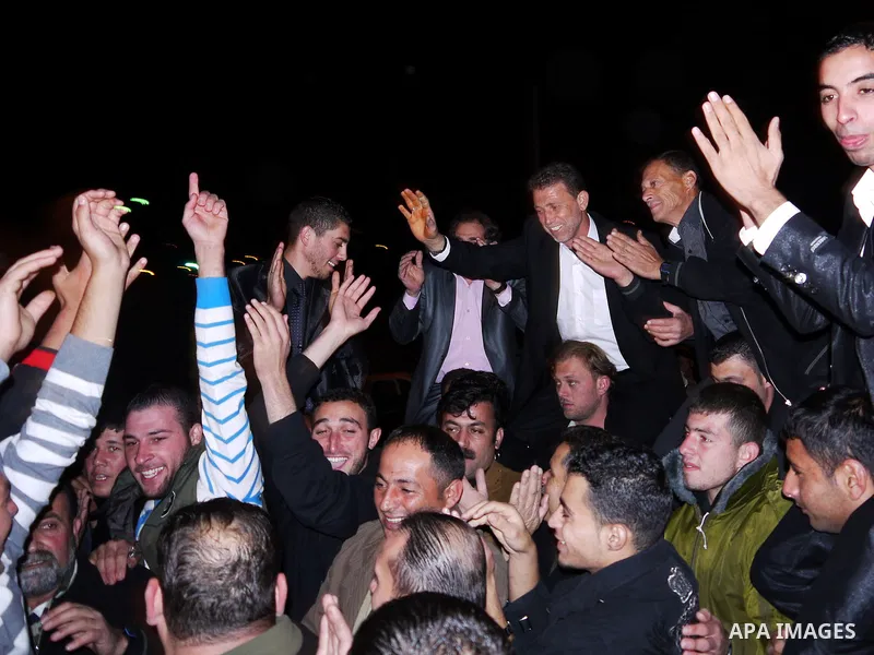 Palestinian freed prisoner Nael Barghouti and his bride Amal Nafea are greeted by relatives and friends during their wedding, in the West Bank city of Ramallah on Nov. 18,2011. Nael Barghouti released from the Israeli ja...