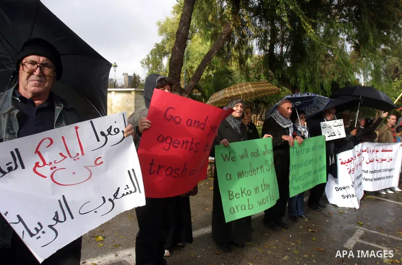Israel Arabs and Palestinians protest against US in front of the American consulate during a demonstration in support for the Syrian President Bashar al-Assad in west Jerusalem on November 19, 2011. Photo by Mahfouz Abu...