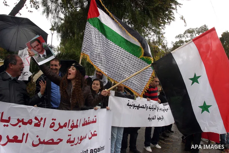 Israel Arabs and Palestinians protest against US in front of the American consulate during a demonstration in support for the Syrian President Bashar al-Assad in west Jerusalem on November 19, 2011. Photo by Mahfouz Abu...