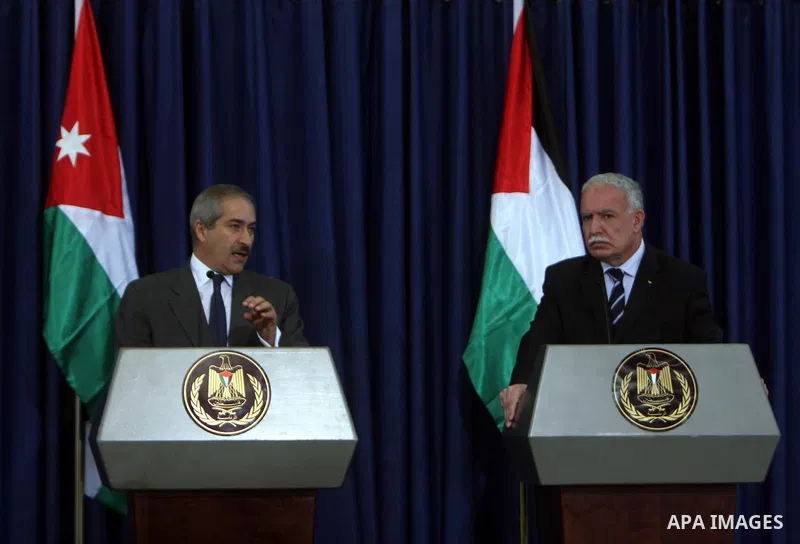 Jordanian Foreign Minister Nasser Judeh and his Palestinian counterpart Riyad al-Malki hold a news conference after the meeting of King Abdullah of Jordan with Palestinian President Mahmoud Abbas in the West Bank city of...