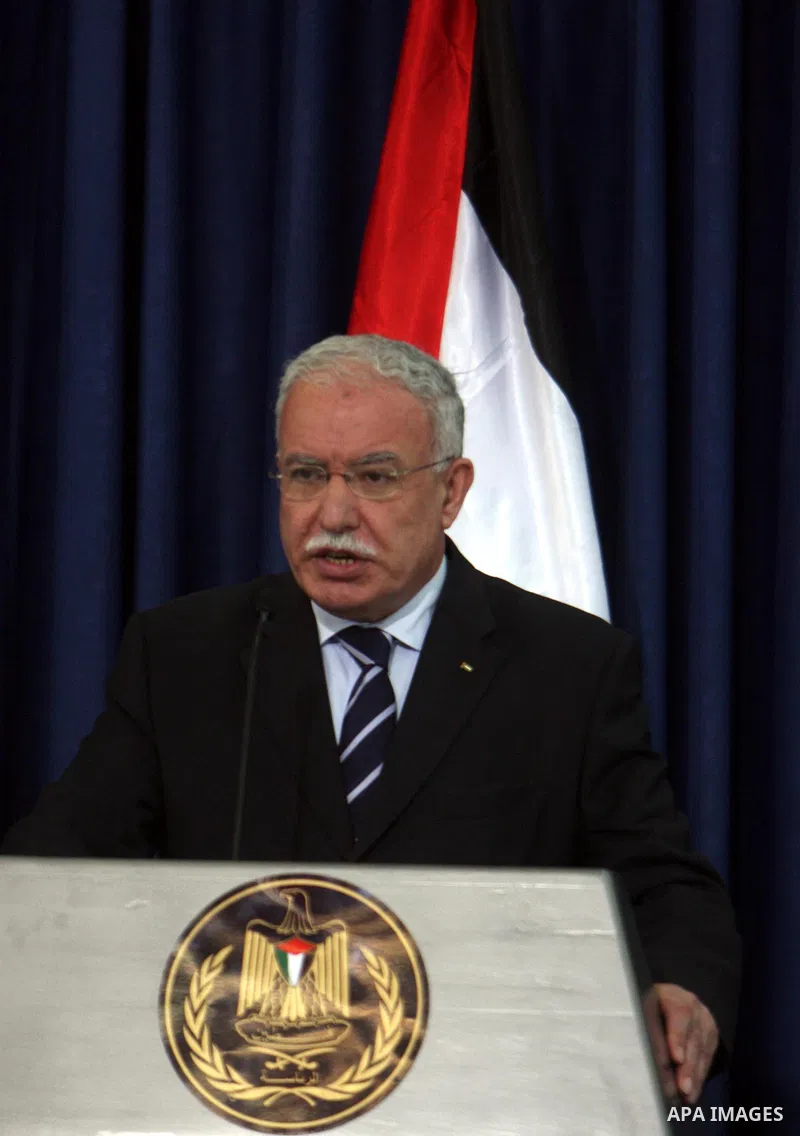 Palestinian Foreign Minister Riyad al-Malki and his Jordanian counterpart Nasser Judeh hold a news conference after the meeting of King Abdullah of Jordan with Palestinian President Mahmoud Abbas in the West Bank city of...