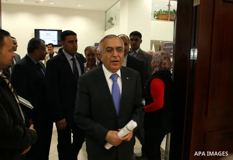 Palestinian Prime Minister Salam Fayyad participate in the opening ceremony of the fifth annual of the Palestinian capital market forum, in the West Bank city of Ramallah November 21, 2011. Photo by Issam Rimawi