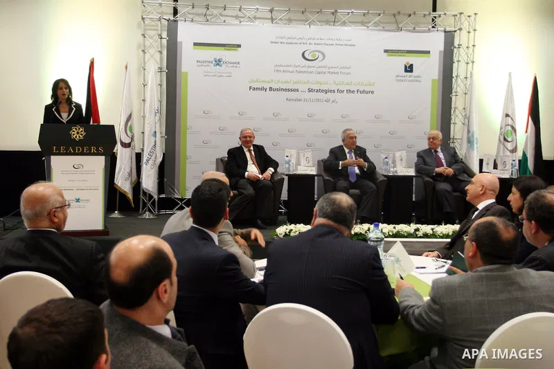 Palestinian Prime Minister Salam Fayyad participate in the opening ceremony of the fifth annual of the Palestinian capital market forum, in the West Bank city of Ramallah November 21, 2011. Photo by Issam Rimawi