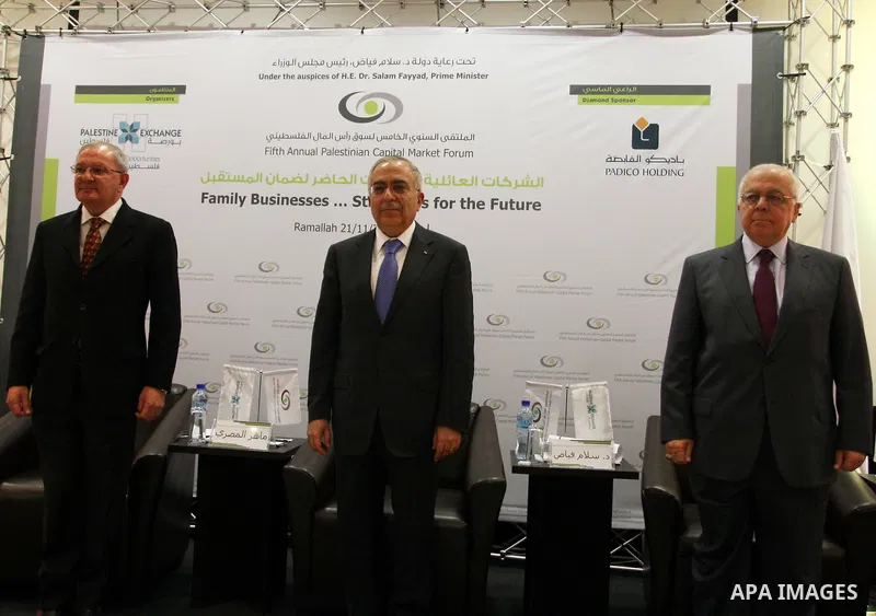 Palestinian Prime Minister Salam Fayyad participate in the opening ceremony of the fifth annual of the Palestinian capital market forum, in the West Bank city of Ramallah November 21, 2011. Photo by Issam Rimawi
