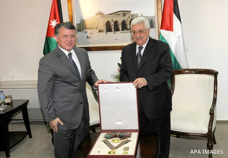 Palestinian President Mahmoud Abbas and King Abdullah of Jordan meet in the West Bank city of Ramallah November 21, 2011. Abdullah arrived in Ramallah on Monday for a rare visit to the Israeli-occupied West Bank, as the...