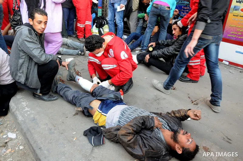 Egyptian protesters clash with security forces on the third day of at Tahrir Square in Cairo on November 21, 2011. Fresh clashes erupted in Cairo's Tahrir Square between police and protesters demanding the end of army ru...