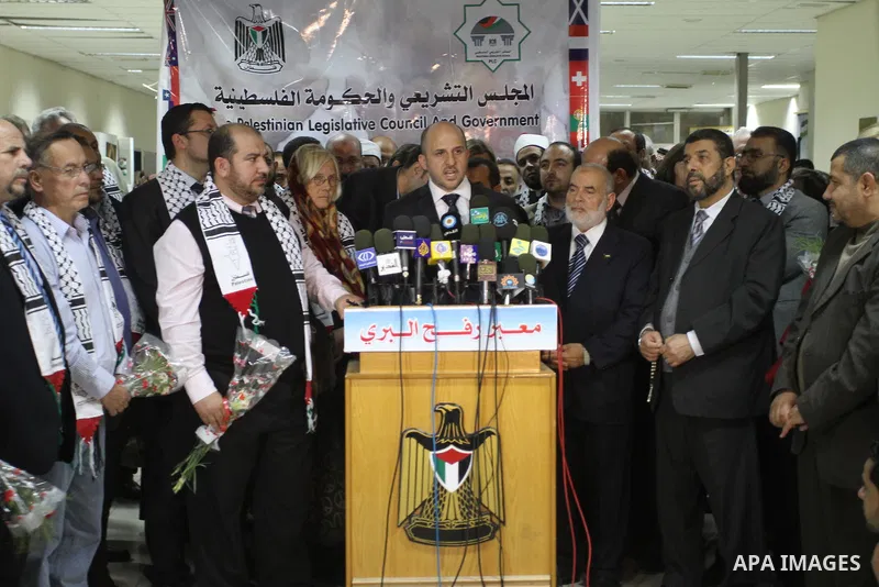 Palestinians take part in a press conference to receive the international delegation, which includes European parliamentarians and international and solidarities Arab to break the siege on Gaza, in Gaza city on Nov. 21,...