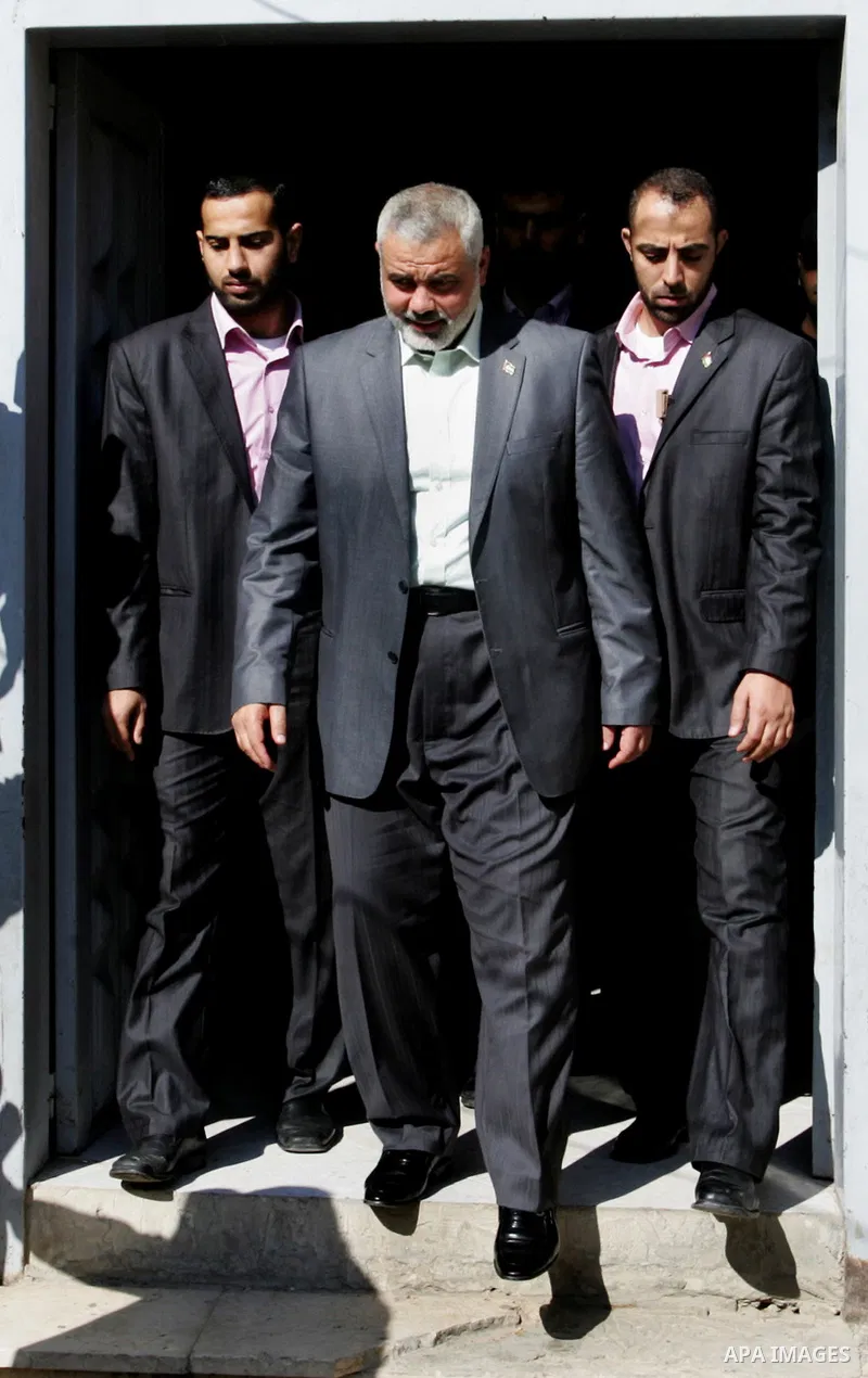 Palestinian Prime Minister in Gaza strip, Ismail Haniyeh visits the family of Ahmed al-Sheikh Khalil in the southern Gaza Strip town of Rafah on Nov. 22,2011. Ahmed al-Sheikh Khalil the commander of al-Quds Brigades the...
