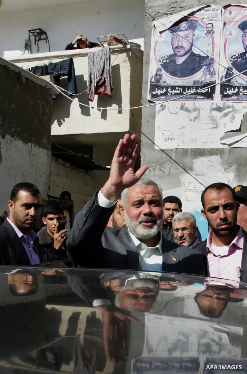 Palestinian Prime Minister in Gaza strip, Ismail Haniyeh visits the family of Ahmed al-Sheikh Khalil in the southern Gaza Strip town of Rafah on Nov. 22,2011. Ahmed al-Sheikh Khalil the commander of al-Quds Brigades the...
