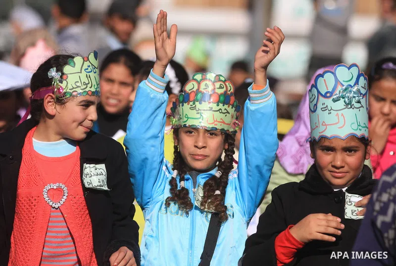 Palestinian children take part in a celebration to mark the International Children Day in Gaza city on Nov. 22,2011. Photo by Majdi Fathi