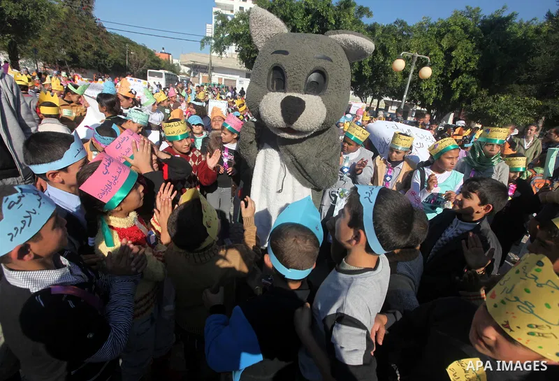Palestinian children take part in a celebration to mark the International Children Day in Gaza city on Nov. 22,2011. Photo by Majdi Fathi
