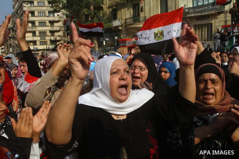 Thousands of Egyptian protesters attend a rally in Tahrir Square on the fourth day of clashes between protesters and riot police in the capital Cairo, on November 22, 2011, as they demand an end to military rule, heighte...