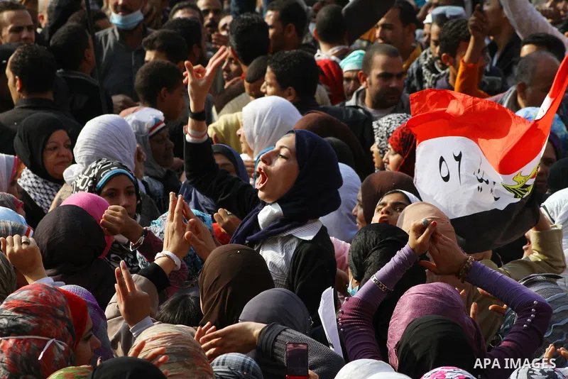 Thousands of Egyptian protesters attend a rally in Tahrir Square on the fourth day of clashes between protesters and riot police in the capital Cairo, on November 22, 2011, as they demand an end to military rule, heighte...