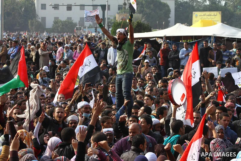 Thousands of Egyptian protesters attend a rally in Tahrir Square on the fourth day of clashes between protesters and riot police in the capital Cairo, on November 22, 2011, as they demand an end to military rule, heighte...