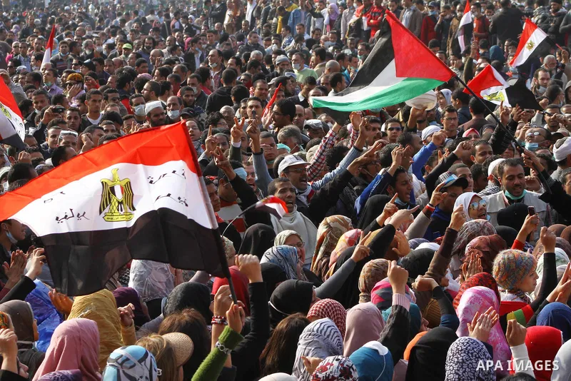 Thousands of Egyptian protesters attend a rally in Tahrir Square on the fourth day of clashes between protesters and riot police in the capital Cairo, on November 22, 2011, as they demand an end to military rule, heighte...